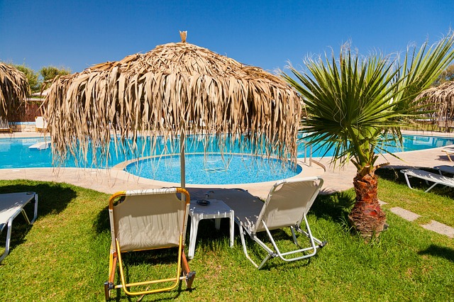 Sunbeds by a pool